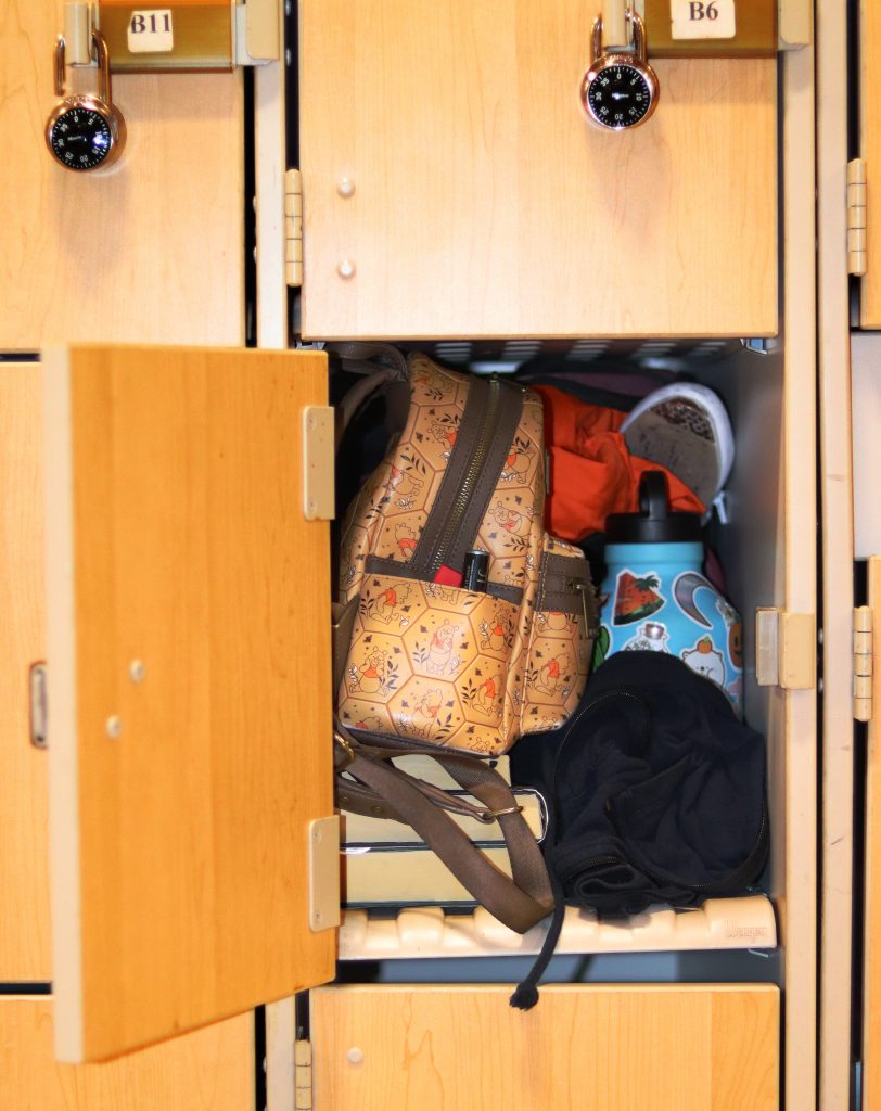 Photo Illustration of an overfilled locker in the Center for the Fine and Performing Arts.