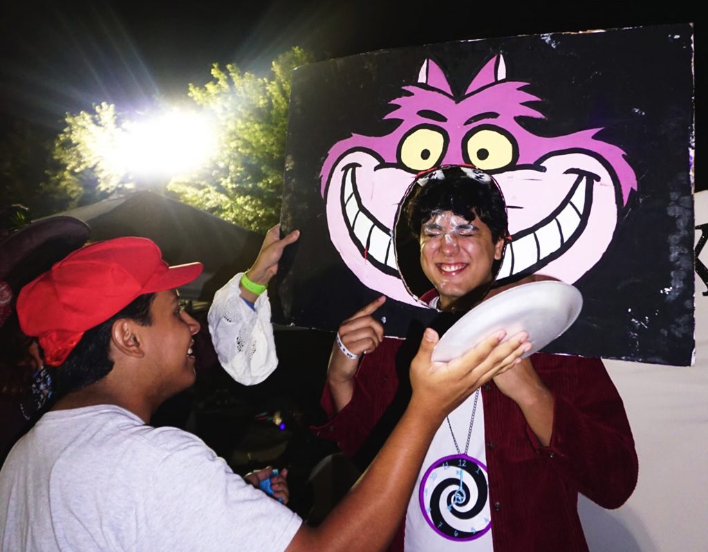 Students throw pies in faces during Halloween Fest.