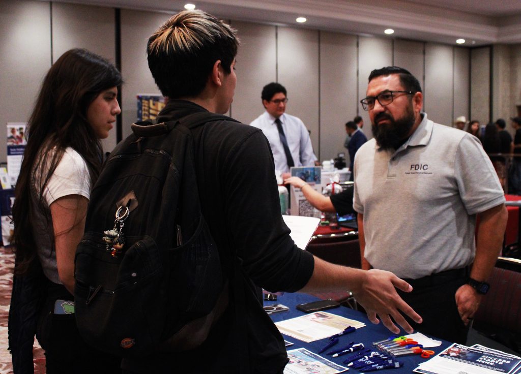 speaking to students at the career fair